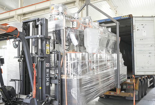 Volledig automatische notencoatingsmachine met drie stations verscheept naar Maleisië